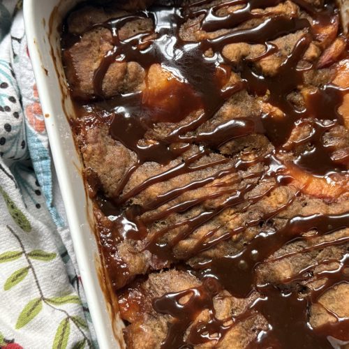 Paleo peach cobbler with glaze on top.