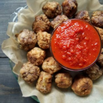 whole30 meatballs image with red sauce