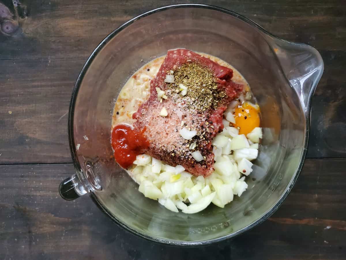 All of the ingredients in a mixing bowl ready to be mixed.