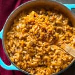 a spoon over a dish of gluten free hamburger helper.