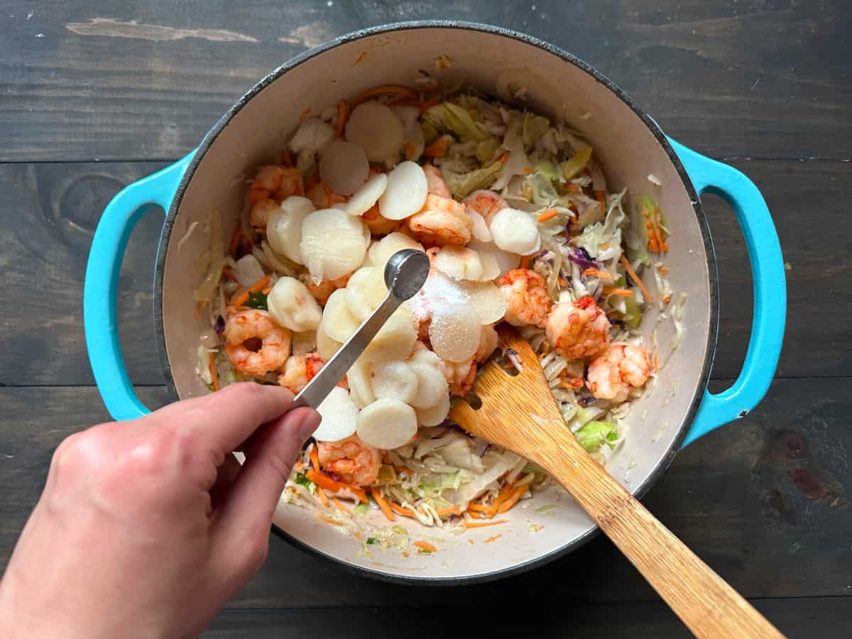The remaining ingredients being added to the pot.