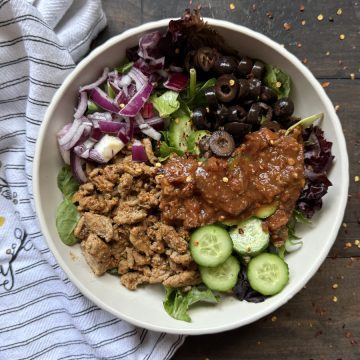 Healthy turkey burrito bowls with a towel.