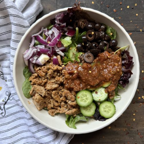 Healthy turkey burrito bowls with a towel.