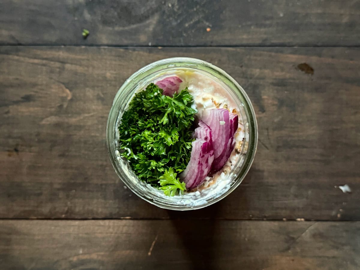 All of the ingredients inside of a mason jar.